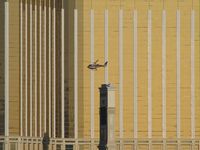 UNKNOWN @ KLAS - One of the many 'Tour' Helicopter flying past Mandalay Bay. I certainly wish I had a better zoom lense. - by Brad Campbell