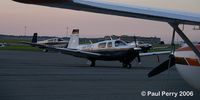 N830FJ @ ECG - Framed up by a Cessna, Mooney in for the weekend - by Paul Perry