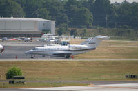 N946QS @ PDK - Tied down @ Signature Flight Services - by Michael Martin