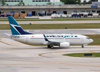 C-FWSV @ KFLL - Taxiing at Ft Lauderdale - by Ivan Cholakov