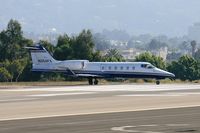 N254FX @ SMO - 2002 Bombardier Learjet 60 N254FX taxiing onto RWY 21 in preparation for departure to Metropolitan Oakland Int'l (KOAK). - by Dean Heald