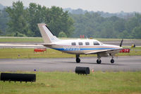 N9095S @ PDK - Landing Runway 20R - by Michael Martin