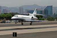 N900HE @ SMO - 1988 Dassault Falcon 900 N900HE nearing touchdown on RWY 21 at Santa Monica Municipal Airport (KSMO) - Santa Monica, California. - by Dean Heald