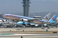 N762AN @ LAX - American Airlines N762AN (FLT AAL169) departing RWY 25R enroute to Narita Int'l (RJAA), Japan. - by Dean Heald