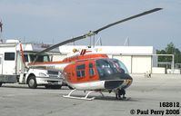 162812 @ NCA - TH-57, a fitting display at a large helo base - by Paul Perry
