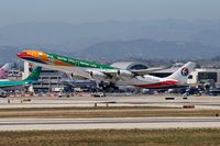 B-6055 @ LAX - China Eastern B-6055 Expo 2010 (FLT CES586) departing RWY 25R enroute to Shanghai Pudong (ZSPD). - by Dean Heald
