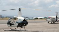 N7049C @ SIG - R22 from isla grande flying school - by jay