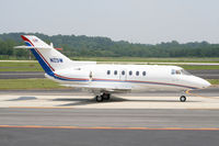 N25W @ PDK - Taxing to Runway 2R - by Michael Martin
