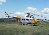 N37788 @ OSH - UH-19D 57-5937 - by Glenn E. Chatfield