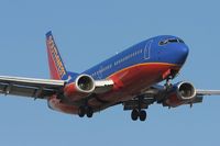 N397SW @ LAX - Southwest Airlines N397SW (FLT SWA2025) from Las Vegas McCarran Int'l (KLAS) on final approach to RWY 24R. - by Dean Heald