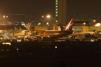 VH-OEJ @ LAX - Qantas Airways VH-OEJ Wunala Dreaming at the American Airlines terminal late at night. - by Dean Heald