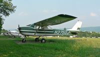 N3750J @ N05 - Heading a lineup of small craft at Hackettstown Airport is this 1966 Cessna 150. - by Daniel L. Berek