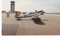 N58651 @ CMA - 1941 Ryan Aeronautical ST-3KR as PT-22, at Camarillo Airshow, CMA Tower in background - by Doug Robertson