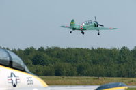 N522TW @ RKD - Taking off at Owls Head Transportation Museum airshow - by Jason Philbrook