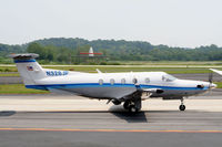 N328JP @ PDK - Taxing past Mercury Air Service - by Michael Martin