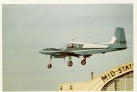 UNKNOWN @ PWK - 1955 Cessna 310, two Continental O-470-M 240 Hp, 'tuna' tanks, on close final for landing at PWK, called Palwaukee Airport at the time in Illinois north-westerly of Chicago. - by Doug Robertson