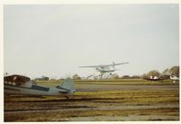 UNKNOWN @ PWK - 1959 Cessna 172, Continental O-300A 145 Hp near touchdown at PWK, Cessna 195 tied down in foreground. Field was called Palwaukee Airport at the time. - by Doug Robertson
