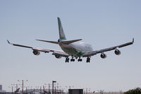 B-16412 @ LAX - EVA Air B-16412 (FLT EVA12) from Taipei, Taiwan - Chiang Kai Shek Int'l (RCTP) seconds from touchdown on RWY 24R. - by Dean Heald