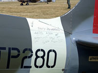 N280TP @ OSH - signatures - by Jim Uber