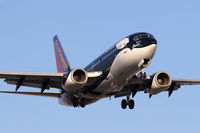 N713SW @ LAX - Southwest Airlines N713SW Shamu (FLT SWA907) from Metropolitan Oakland Int'l (KOAK) on final approach to RWY 24R. - by Dean Heald