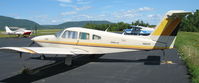 N8212V @ 4B6 - Parked at the ramp at Ticonderoga - by Timothy Aanerud