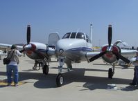 N925DJ @ CMA - 1958 Beech D50A TWIN BONANZA (T-BONE), two Lycoming geared GO-480-G2F6 295 Hp each, three abreast cockpit seating-pilot, one co-pilot & one passenger, two passsengers behind, pristine, as-new appearance! - by Doug Robertson