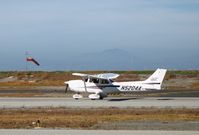 N5204A @ SQL - Looking Up LLC 2002 Cessna 172S taking-off @ San Carlos Municipal Airport, CA - by Steve Nation