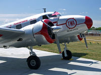 N18137 @ OSH - Lockheed 12A, in TWA livery - by Jim Uber