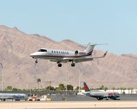 N300JC @ LAS - Ceco Enterprises LLC 2002 Bombardier Learjet 45 N300JC (cn 45-209) from Reno Tahoe Int'l (KRNO) seconds from landing on RWY 25L. - by Dean Heald