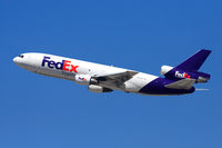 N559FE @ LAX - Fed Ex N559FE (FLT FDX3012) climbing out from RWY 25R enroute to Chicago Ohare Int'l (KORD). - by Dean Heald