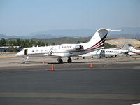 N487QS @ CRQ - Netjets 1996 Gulfstream Aerospace G-IV visiting @ McClellan-Palomar Airport, CA - by Steve Nation