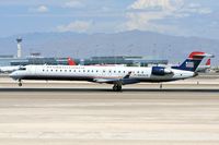 N938LR @ LAS - US Airways Express (Mesa Airlines) N938LR (FLT ASH2969) from Los Angeles Int'l (KLAX) landing on RWY 25L. - by Dean Heald