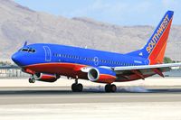 N455WN @ LAS - Southwest Airlines N455WN (FLT SWA2966) from Tucson Int'l (KTUS) touching down on RWY 25L. - by Dean Heald