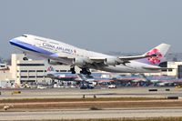 B-18206 @ LAX - China Airlines B-18206 (FLT CAL5) departing RWY 25R enroute to Chiang Kai Shek Int'l (RCTP). - by Dean Heald