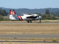 N433DF @ STS - Santa Rosa-based CDF S-2T Tanker #86 with Bob Valette at the controls touches down in nasty crosswind at Sonoma County Airport, CA following firefighting mission - by Steve Nation