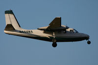 N444WA @ AGP - final in the morning to RWY 31 - by Karl Haller