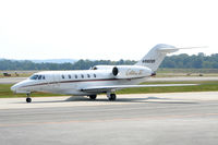 N982QS @ PDK - Taxing to Signature Flight Services - by Michael Martin