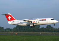 HB-IXS @ EGCC - Swiss RJ landing 06R - by Kevin Murphy