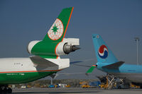 B-16110 @ VIE - Eva Air MD11 with Korean Air Boeing 747-400 - by Yakfreak - VAP