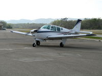 N334MT @ AJO - 1962 Beech 35-B33 taxying in @ Corona Municipal Airport, CA from Big Bear, CA - by Steve Nation