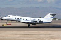 N17KJ @ LAS - 1977 Gulfstream II N17KJ (FLT UJT17 aka Unijet 17) touching down on RWY 25L after a short flight from Van Nuys (KVNY). - by Dean Heald