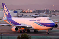 JA8182 @ LAX - Nippon Cargo Airlines JA8182 taxiing to the cargo terminal after arriving on RWY 25R. - by Dean Heald