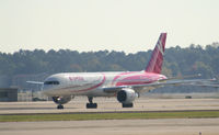 N610DL @ ATL - Breast Cancer Awareness Paint - by Michael Martin