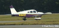 N1943T @ GSB - Taxiing out, in line with the bulk of the civvie traffic - by Paul Perry