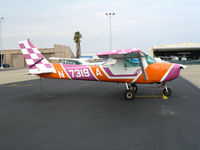 N7319A @ LHM - Wild color scheme on 1977 Cessna Aerobatic-capable A150M @ Lincoln Municipal Airport, CA - by Steve Nation