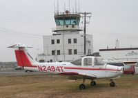 N2494T @ MIC - Parked at Minneapolis Crystal, Crystal tower in background - by Timothy Aanerud
