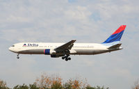 N138DL @ ATL - Over the numbers of 27L - by Michael Martin