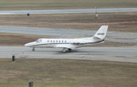 N8486 @ BTV - 2001 Cessna 560 Citation Encore, c/n 560-0554, Taxiing for departure from Burlington, VT - by Timothy Aanerud