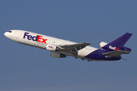 N375FE @ LAX - FedEx N375FE (FLT FDX3019) climbing out from RWY 25R enroute to Chicago O'Hare Int'l (KORD). - by Dean Heald