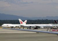 B-2493 @ YVR - visitors from Japan and China in Vancouver - by Micha Lueck